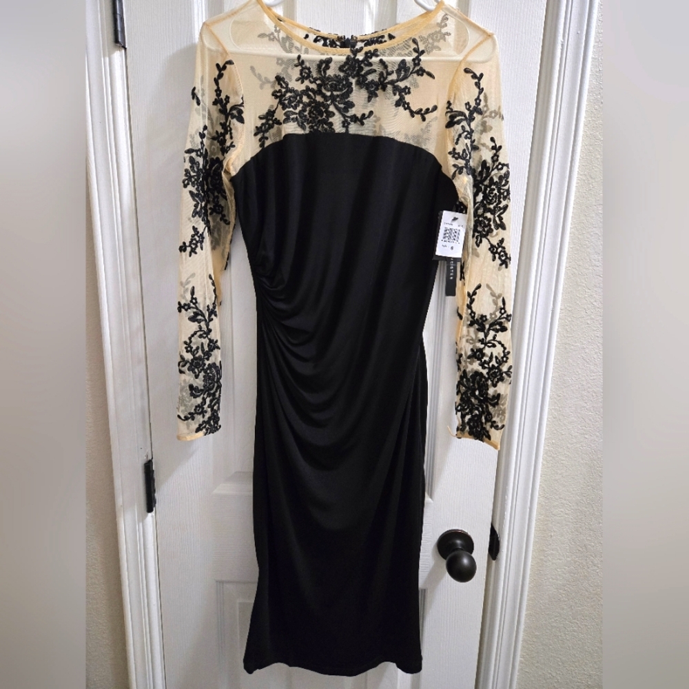 Elegant Black and Cream Dress with Lace Detailing